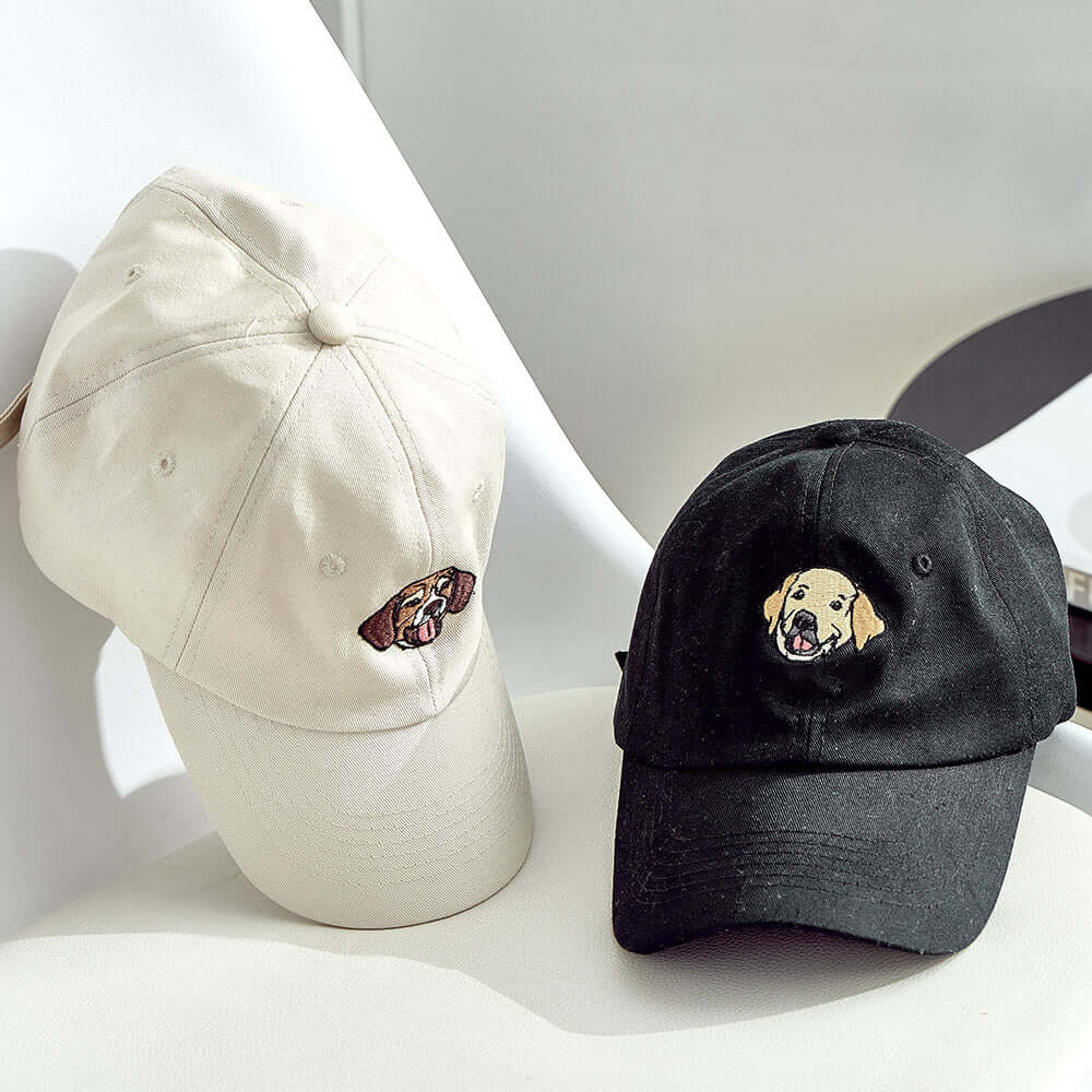 Custom dog embroidered baseball hats in black and white, featuring cute dog face designs for pet lovers