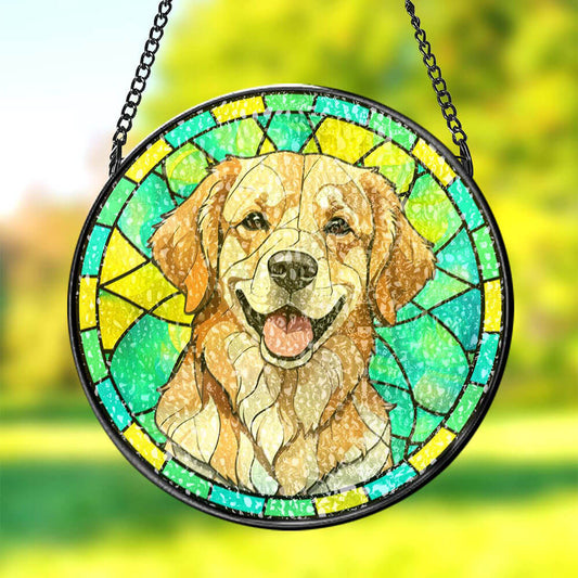 Round stained glass suncatcher with golden retriever design hanging outdoors in sunlight